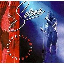 Cover of Live!, which showcases two photographs of the singer during the concert. On the left, the singer waves to those in attendance wearing a leather jacket, tight pants, and boots backed in a red background. On the right, a spotlight is on the singer while she performs in an unbuttoned jacket backed in a blue background.