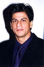 Shah Rukh Khan posing for the camera at the launch of srkworld.com in 2000