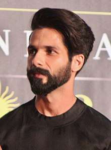 An upper body shot of Shahid Kapoor, looking away from the camera