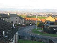 A view over houses with the Forth Valley and Ochil Hills in the background