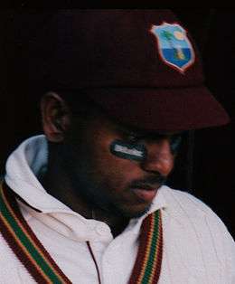 Shivnarine Chanderpaul, wearing his West Indies cricket kit, with anti-glare patches beneath his eyes.