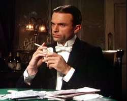 Sam Neill portraying Reilly in the TV miniseries Reilly, Ace of Spies (1983).