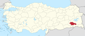 Siirt highlighted in red on a beige political map of Turkeym