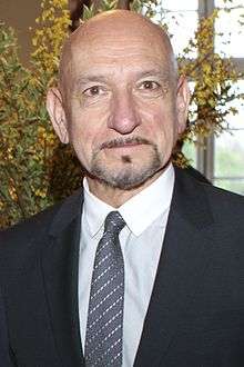 Photo of Ben Kingsley—a bald man with tan skin, of Indian ethnicity, with brown eyes, gray goatee and big nose, around 69 years of age—at the Sundance UK Film Festival in 2012.