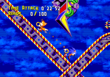 Gameplay screenshot of Sonic Crackers, showing Sonic and Tails in a carnival-esque stage. The tethering mechanic from Sonic Crackers would later surface in Knuckles' Chaotix.
