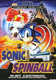 The game's European cover art. The artwork shows Sonic the Hedgehog running in the foreground, while series antagonist Doctor Robotnik is angrily chasing him on a floating pod. The background shows the volcanic Mt Mobius erupting. Pinball flippers can be seen at the bottom.