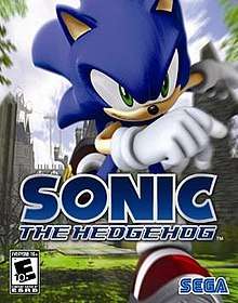 The North American box art of Sonic the Hedgehog, depicting the titular character running in the kingdom of Soleanna. The game's logo is shown in the middle of the box, and the Sega logo is printed on the bottom right hand corner.
