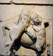 Sculpture of a man and a centaur.