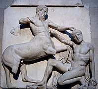 Sculpture of a fight between a man and a centaur.