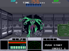 Horizontal rectangle video game screenshot that is a digital representation of a grey room on a space ship. Centered is a green, multi-limbed alien bursting through the wall of a dark corridor.