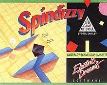 Artwork of a horizontal rectangular box. The top portion reads "Spindizzy". The left half depicts a yellow grid, and the right half displays advertising and publisher information against a black backdrop.