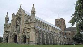 St Albans Abbey following restoration. A mix of architectural styles and a pitched roof.