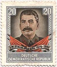 head shot of man with moustache on postage stamp