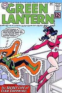 A cartoon image of Green Lantern and a super villainess (wearing shades of violet) in mid-air, high over a city below. The woman is looking over her shoulder at Green Lantern and shooting a yellow beam of light at him with her hand. The beam has hit him in the chest and he is surrounded by a wavy orange outline. Green Lantern is being forced backward and away from the villainess. A thought bubble over his head shows he is thinking: "She hurled a repelling ray at me! There must be a way of defeating this mystery woman!" The top of the image is titled "Green Lantern" with a small label that reads "DC" in the upper left corner. The bottom of the image has a caption that reads: "The Secret Life of Star Sapphire!"