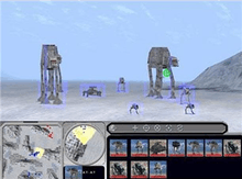 The top two-thirds of the screen depicts gameplay of Imperial walkers and other vehicles moving across an icy surface. The bottom third of the screen features a map and various player controls.