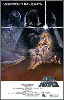 Film poster showing Luke Skywalker triumphantly waving a lightsaber in the air, Princess Leia sitting beside him, and R2-D2 and C-3PO staring at them. A figure of the head of Darth Vader and the Death Star with several starships heading towards it are shown in the background. Atop the image is the text "A long time ago in a galaxy far, far away..." Below is shown the film's logo, above the credits and the production details.