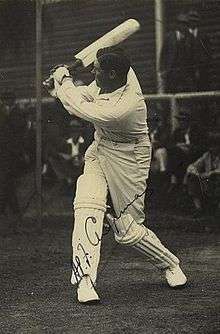 A cricketer batting