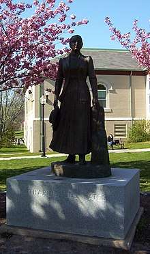 photograph of a statue of Katharine Lee Bates at the Falmouth Public Library