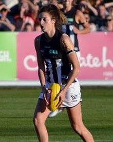 Chiocci playing for Collingwood in the inaugural AFL Women's match in February 2017