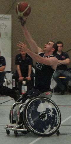 Steve Serio playing wheelchair basketball in 2011