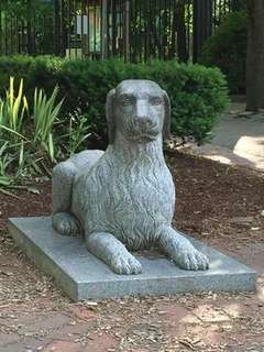 Stone Dog II, located outside the Zoo at Forest Park (Springfield, MA). (photo by C. Welz)  The Stone Dog is a 2.5 foot tall, 4 foot long, 2 foot wide statue of a golden retriever.