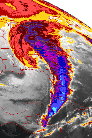 A multicolored satellite view of the eastern United States and a large, expansive storm system. The comma-shaped storm extends from southern Canada to Central America.