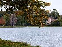 Photograph of Stowe Pool, with Stowe House in the background