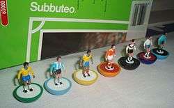 Subbuteo model players with Subbuteo packaging