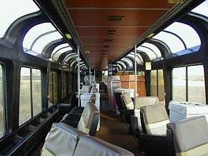 Railcar interior with floor to ceiling windows