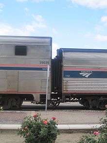 Two silver railcars