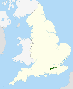 Map of England and Wales with a green area representing the location of the Surrey Hills AONB                 =