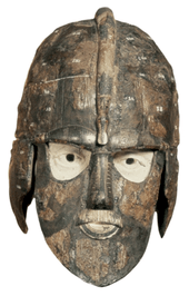 Colour photograph, taken from the front against a white background, of the first reconstruction of the Sutton hoo helmet.