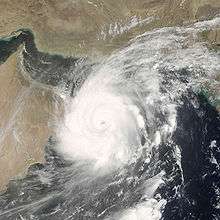 Satellite image of Cyclone Gonu near the coast of Oman, a country in the southeastern portion of the Arabian Peninsula