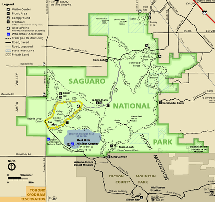Map of the Tucson Mountain District, an irregular squarish shape colored green and surrounded by brown or gold-shaded areas not in the park