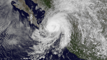 A visible satellite image of Tropical Storm Manuel approaching hurricane intensity just offshore southwestern Mexico on September 18.