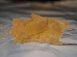 Image of a chunk of impure MDMA