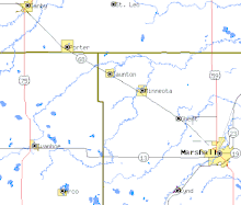 A road map showing Marshall as a larger yellow populated area on a white background near the lower right. Canby, Minneota, Porter and Taunton are along a black line marked as state highway 68 running straight toward the upper left. Lynd is near the bottom right. County boundaries are marked with olive-drab lines.