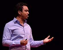 A close-up of Tadi while giving a talk in TEDx Lausanne