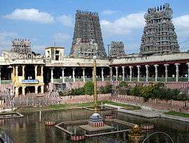 Meenakshi temple gopura and water pool