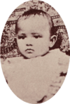 Oval photograph of young baby, 1885.