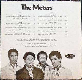 Album's back cover depicting band members in 1969. Left to right: Modeliste, Neville, Porter, Nocentelli.