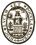 A seal depicting a crowned naked woman holding a goblet in her left hand and a skull in her right, standing in front of a desk with the words "Alma mata Cantabria" on it. The seal is surrounded by the words "Hinc lucem et pocula sacra".