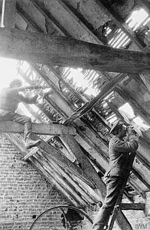 Berkshire territorial sniper team in the loft of a ruined house