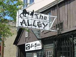 Photograph of the outside of The Alley bar in Oakland