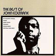 A photograph of John Coltrane's torso, holding his right hand up to his head with a thick black border and the album and song titles around him