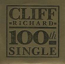 CD single sleeve showing a gold background with embossed gold letters 'Cliff Richard 100th Single'