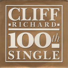 Record sleeve showing a gold background with bold white letters 'Cliff Richard 100th Single'