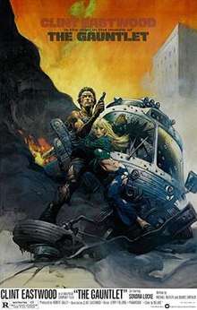 Official poster with Frank Frazetta illustration of Clint Eastwood with ripped off shirt and jeans, holding his gun and hugging Locke, behind them is a ruined bus. Below the duo are the film's title, credits, and release date, above them is the film's slogan.