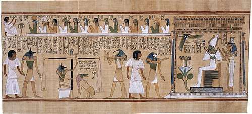Cursive hieratic handwriting in black ink with inks of various colors used to paint pictures of men and anthropomorphic deities traveling through the afterlife in vignette scenes covering the central portion of the document as well as the top right