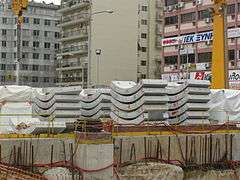 Curved concrete pieces above ground